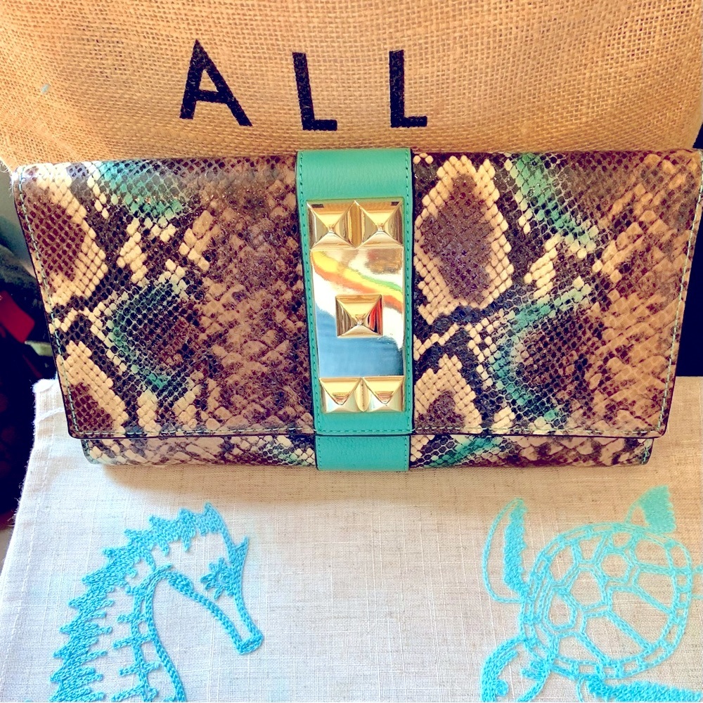Leather Vince Camuto Clutch. Aqua-Teal and Grey Python Print w/ faux Gold trim.